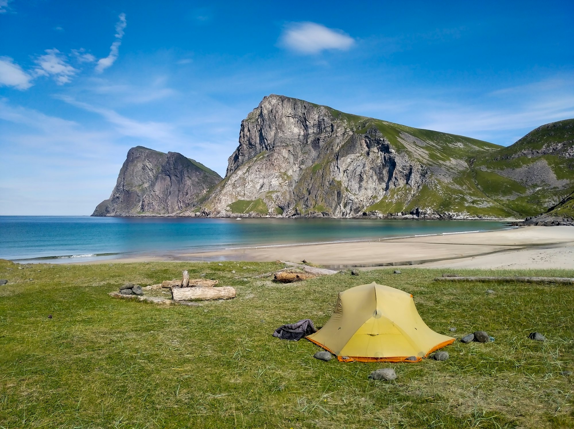 Tents pitched above Kvalvika beach in the Lofoten Islands, Norway